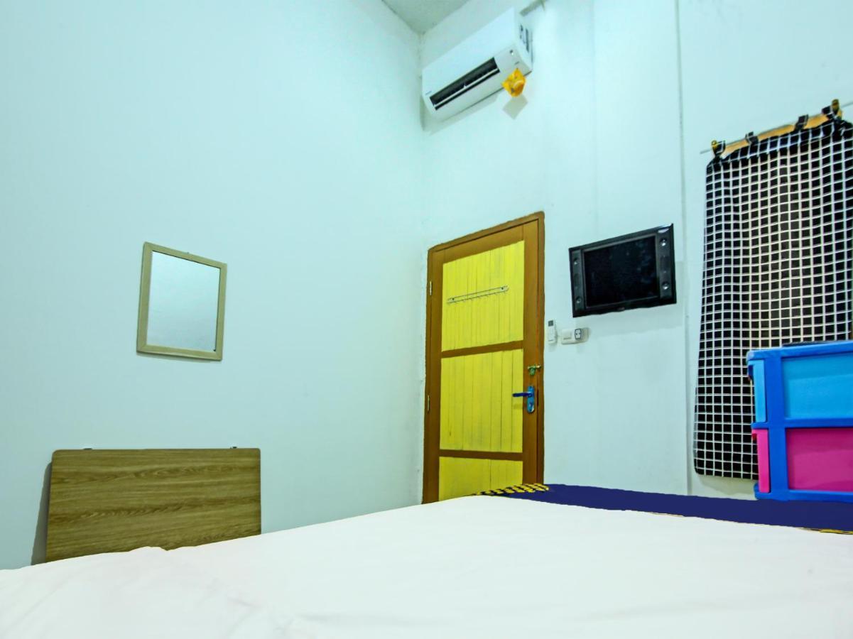 Spot On 92141 Cahaya Syariah Palembang